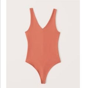 Abercrombie Orange bodysuit Size L
